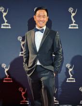 Director Jefferey Chin photographed at the Emmy's in a tuxedo.